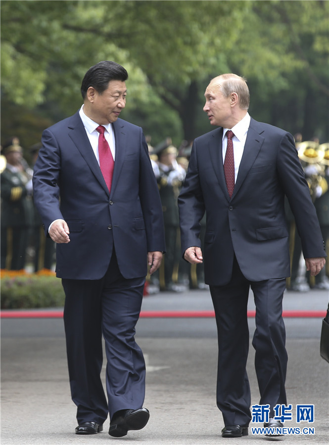 這是會談前，習近平在上海西郊會議中心廣場為普京舉行歡迎儀式。 新華社記者 蘭紅光 攝