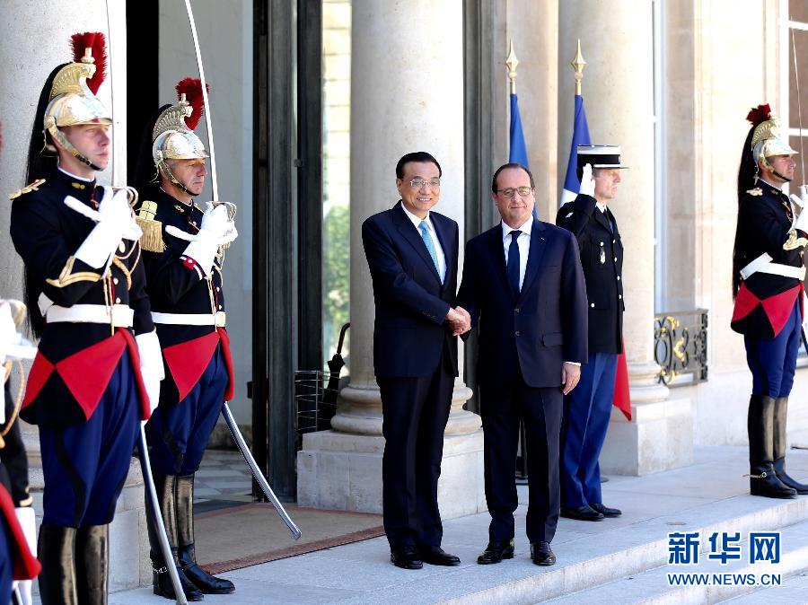 當地時間6月30日下午，中國國務院總理李克強在巴黎愛麗舍宮會見法國總統奧朗德。 新華社記者馬占成攝 