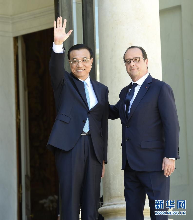 當地時間6月30日下午，中國國務院總理李克強在巴黎愛麗舍宮會見法國總統奧朗德。 新華社記者李學仁攝 