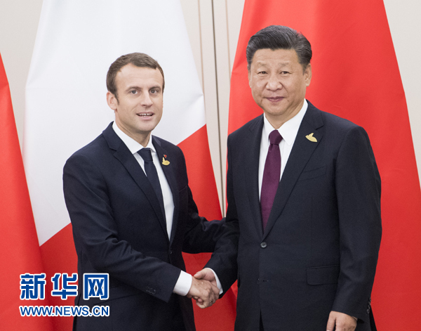 7月8日，國家主席習近平在漢堡會見法國總統馬克龍。新華社記者 李學仁 攝